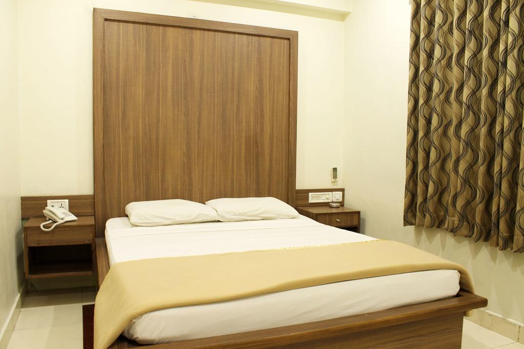 Hotel Stay Inn Bengalúr Pokoj fotografie